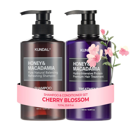 KUNDAL Honey & Macadamia Shampoo front view with Cherry Blossom design