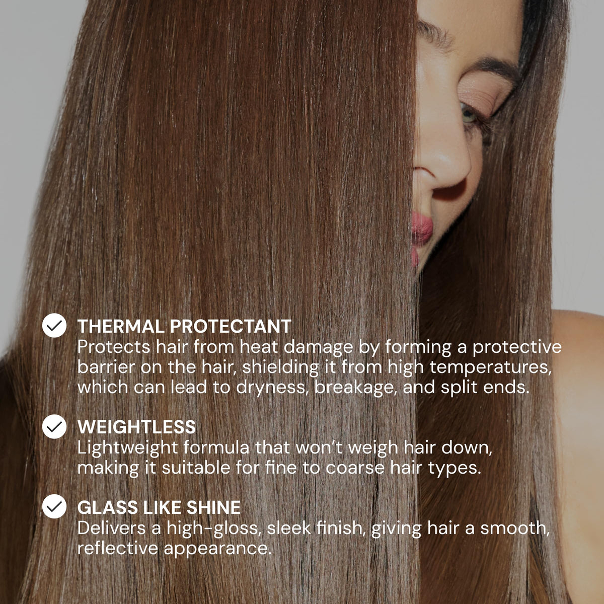 L'ANGE HAIR Glass Hair Heat Protectant Spray lifestyle scene in bathroom