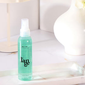 L'ANGE HAIR Sea Salt Texturizing Spray on a vanity
