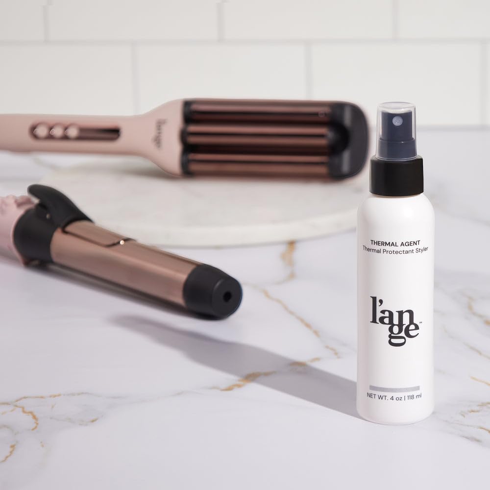 L'ANGE HAIR Thermal Agent Heat Protectant Spray on a vanity table