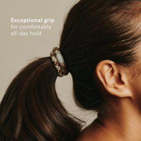 L. Erickson Mocha hair ties displayed on a flat surface