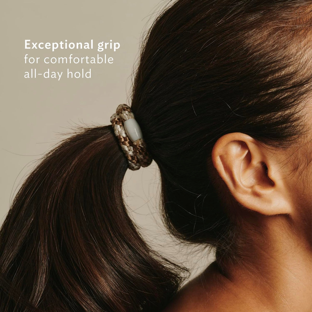 L. Erickson ponytail holders displayed on a flat surface