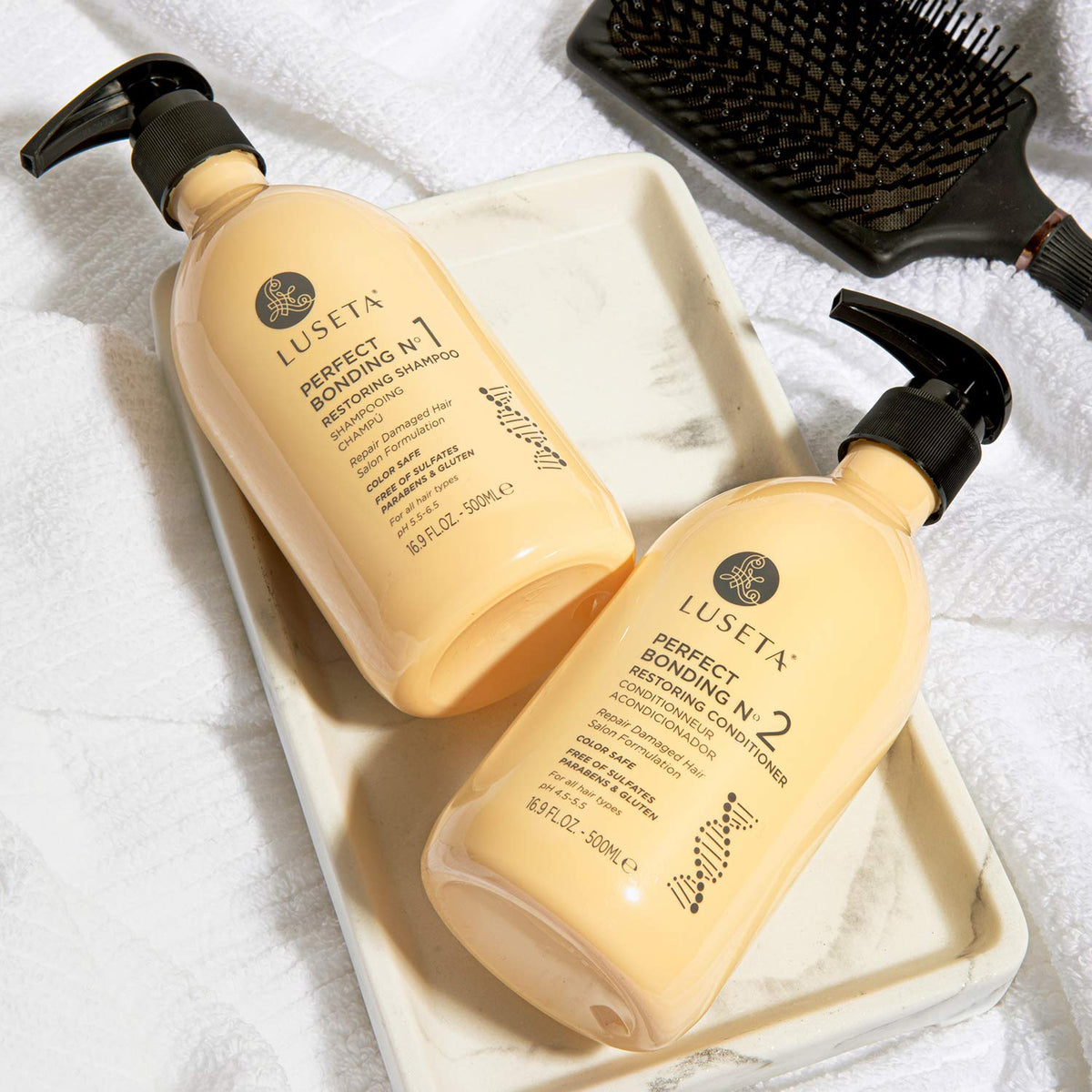 L LUSETA conditioner being applied to hair