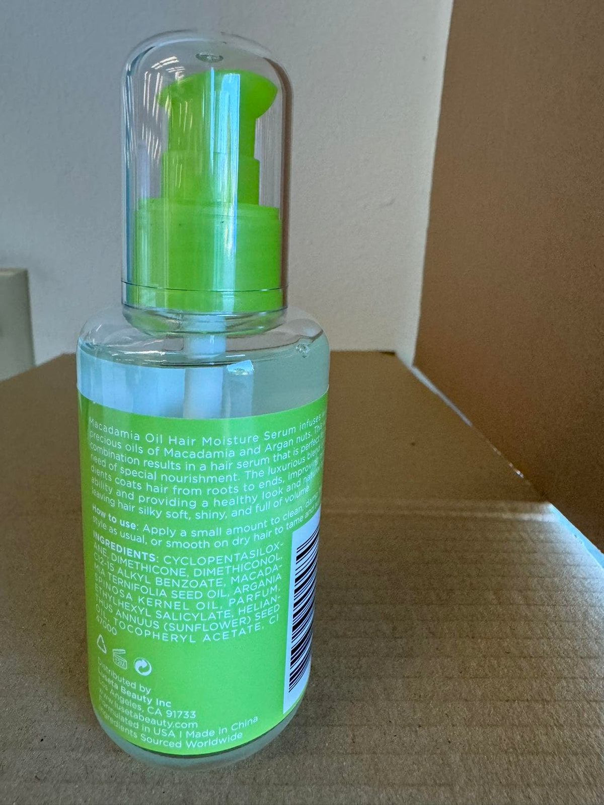 L LUSETA Macadamia Oil Hair Moisture Serum in bathroom setting