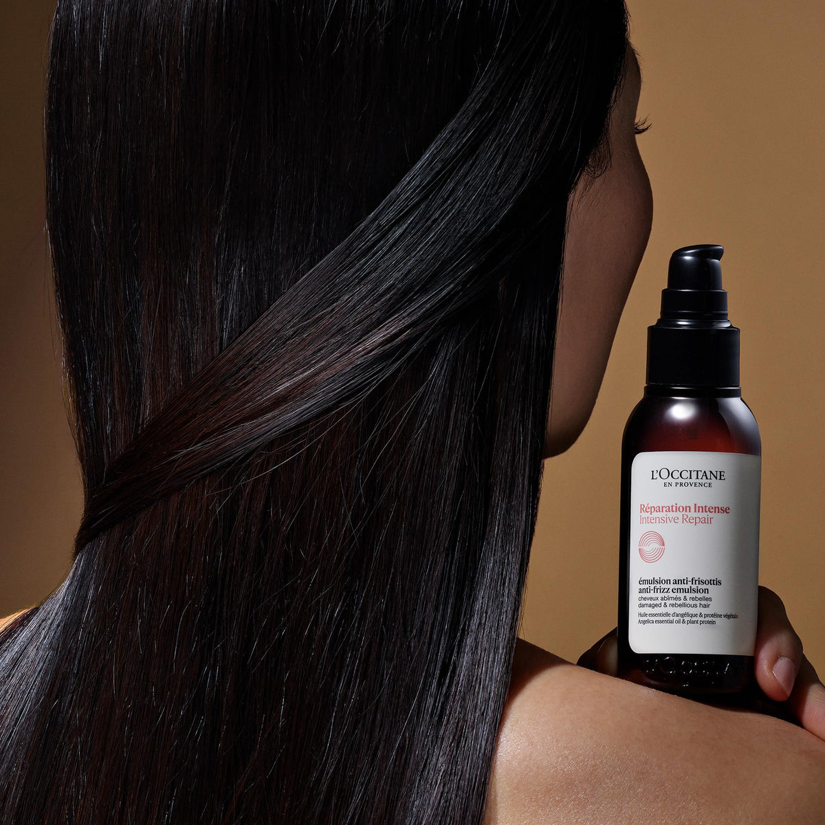 L'OCCITANE Intensive Repair Anti-Frizz Serum application on hair