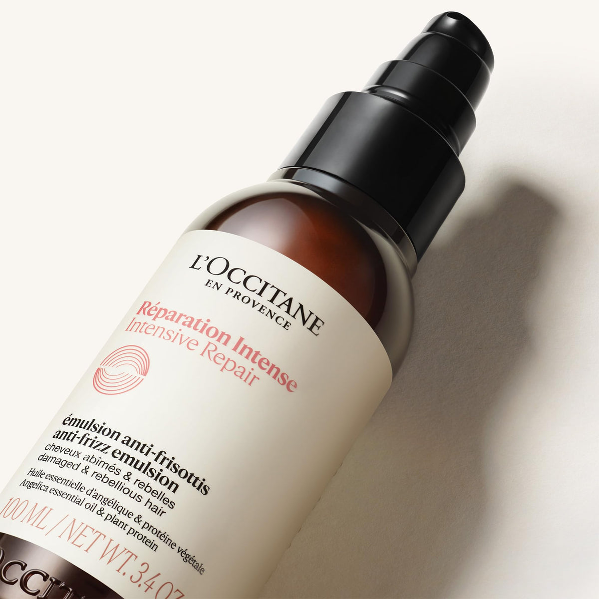 L'OCCITANE Intensive Repair Anti-Frizz Serum bottle side view