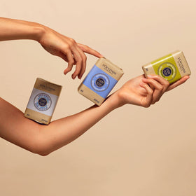 L'OCCITANE Shea Lavender Extra-Gentle Soap on a bathroom counter