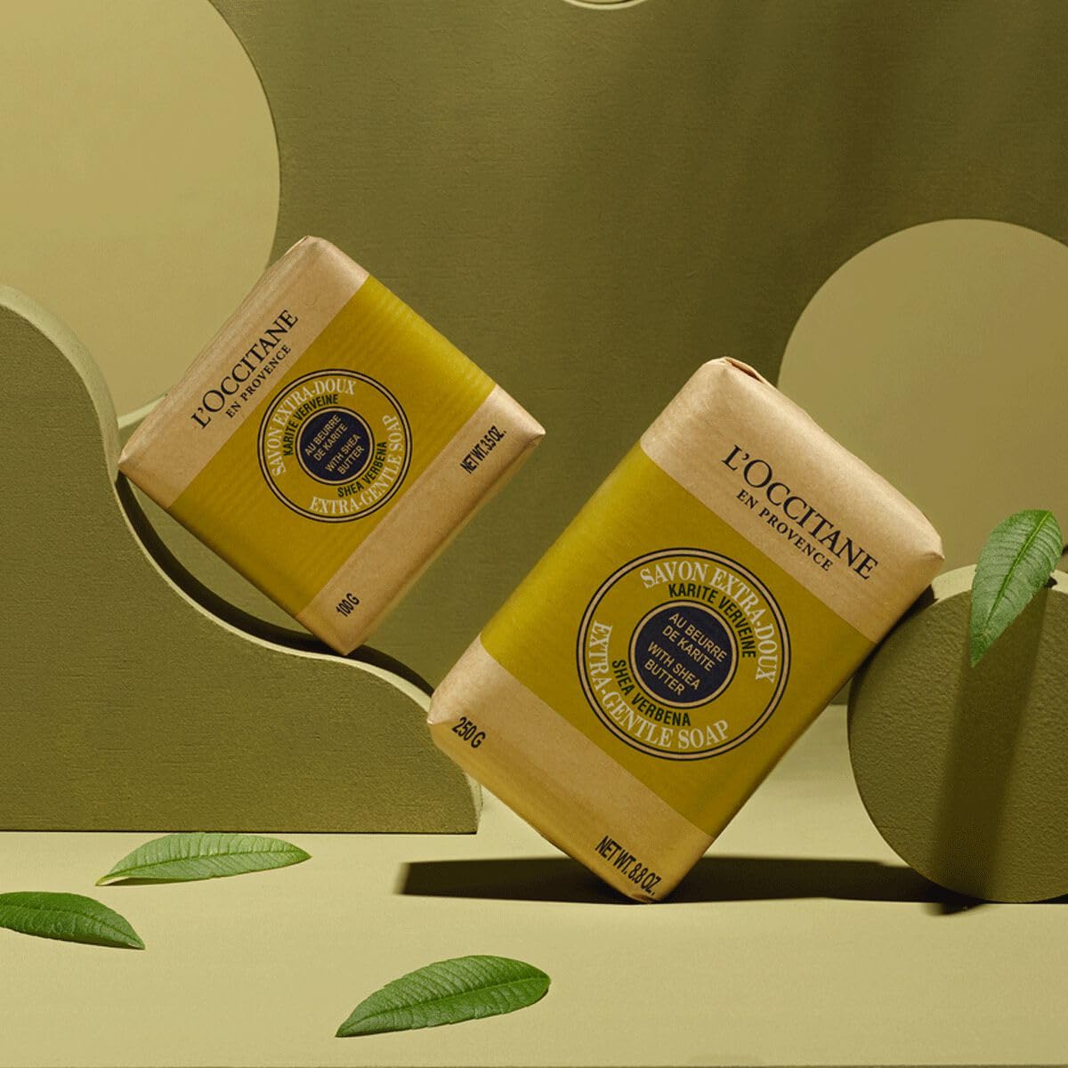 L'OCCITANE Shea Verbena Extra-Gentle Soap on a wooden dish
