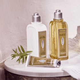 L'OCCITANE Verbena Cooling Hand Cream Gel on a wooden table