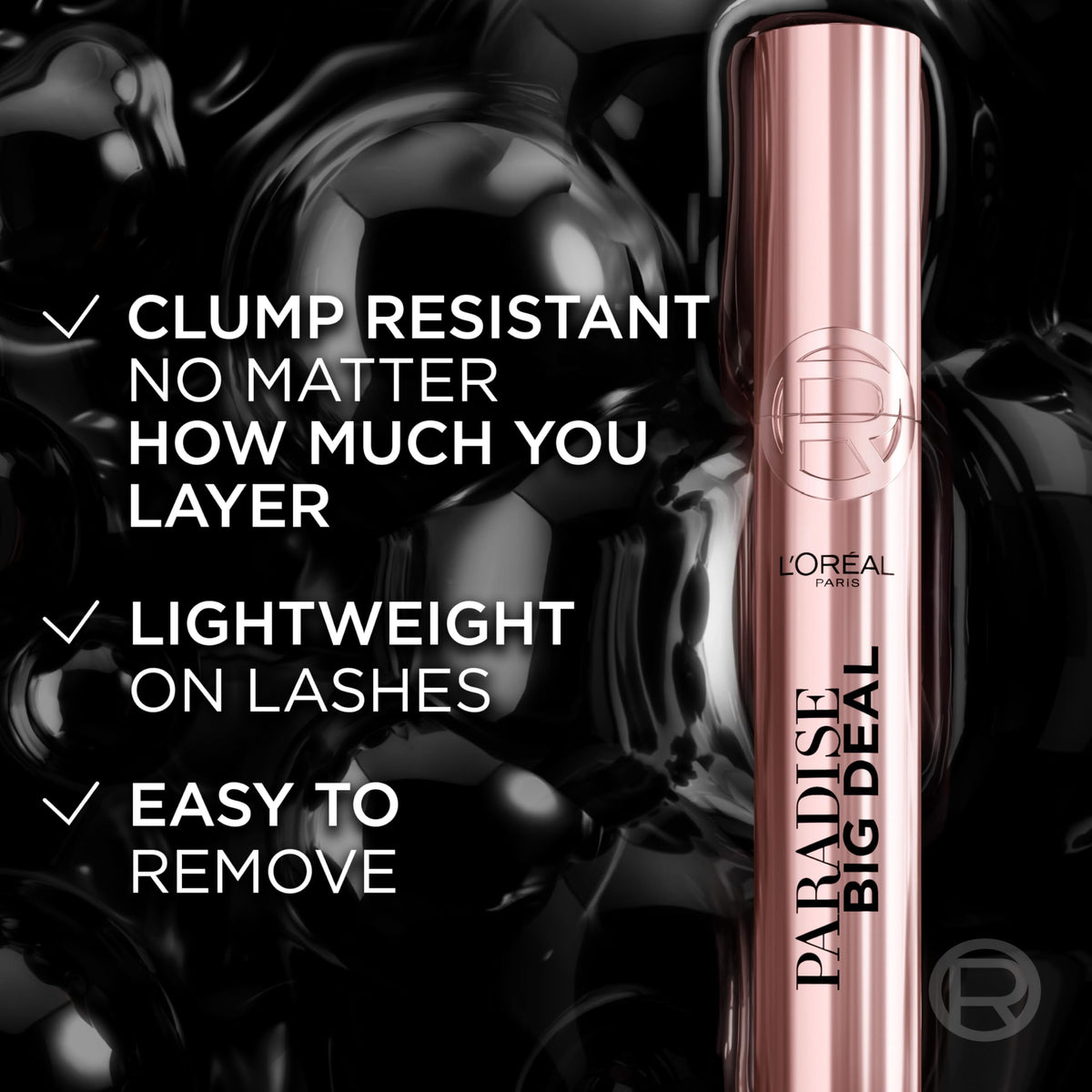 L'Oreal Paris Paradise Big Deal Mascara with makeup products background
