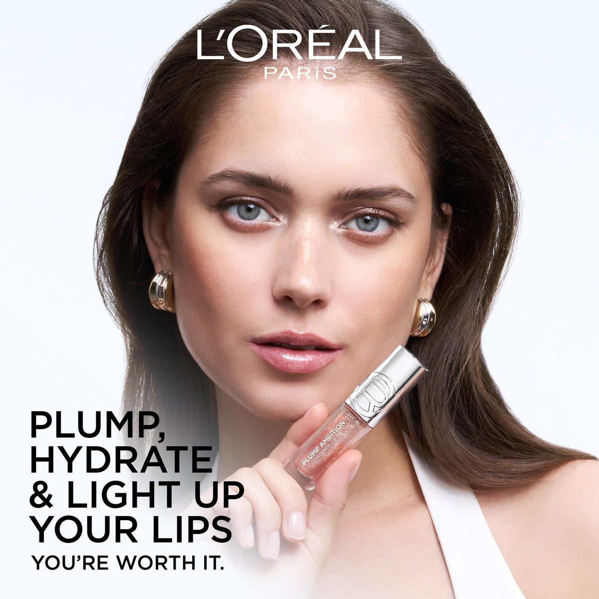 L'Oreal Paris Plump Ambition Lip Oil Ruby Lights packaging on a flat surface