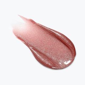 L'Oreal Paris Plump Ambition Lip Oil Shimmer in a beauty setup