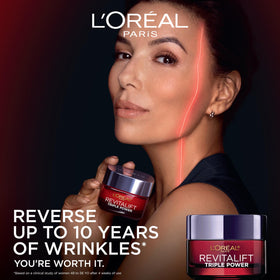 L'Oreal Paris Revitalift Triple Power Face Moisturizer side view showing texture