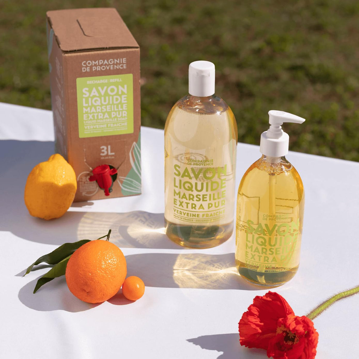 La Compagnie de Provence Fresh Verbena Liquid Hand Soap refill bottle on a bathroom counter
