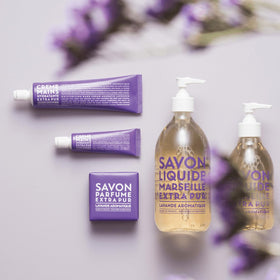 La Compagnie de Provence Marseille Liquid Soap with lavender flowers background