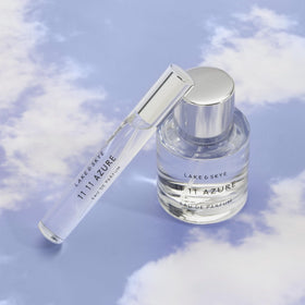 Lake & Skye 11 11 Azure Eau de Parfum bottle with floral background
