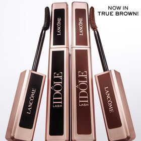 Lancôme Lash Idôle mascara in brown shade on a makeup table