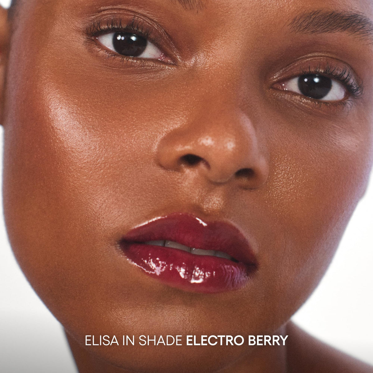 LANEIGE JuicePop Box Lip Tint Electro Berry swatch on skin