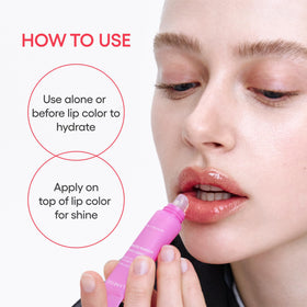 LANEIGE Lip Glowy Balm Berry in a hand for size reference
