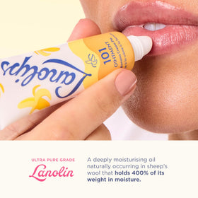 Lanolips 101 Multipurpose Ointment Banana Cream Pie on a wooden surface