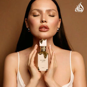 Lattafa Eclaire Eau de Parfum with floral background
