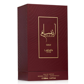 Lattafa Pride Ansaam Gold Eau de Parfum 100ml in lifestyle setting on a vanity