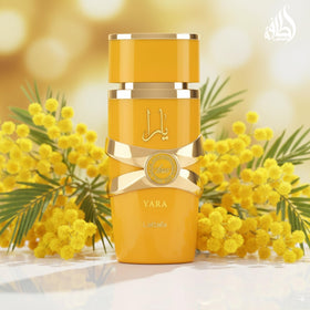 Lattafa Yara Tous Eau de Parfum bottle with tropical fruits