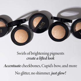 LAURA GELLER Baked Marbleized Highlighter on vanity