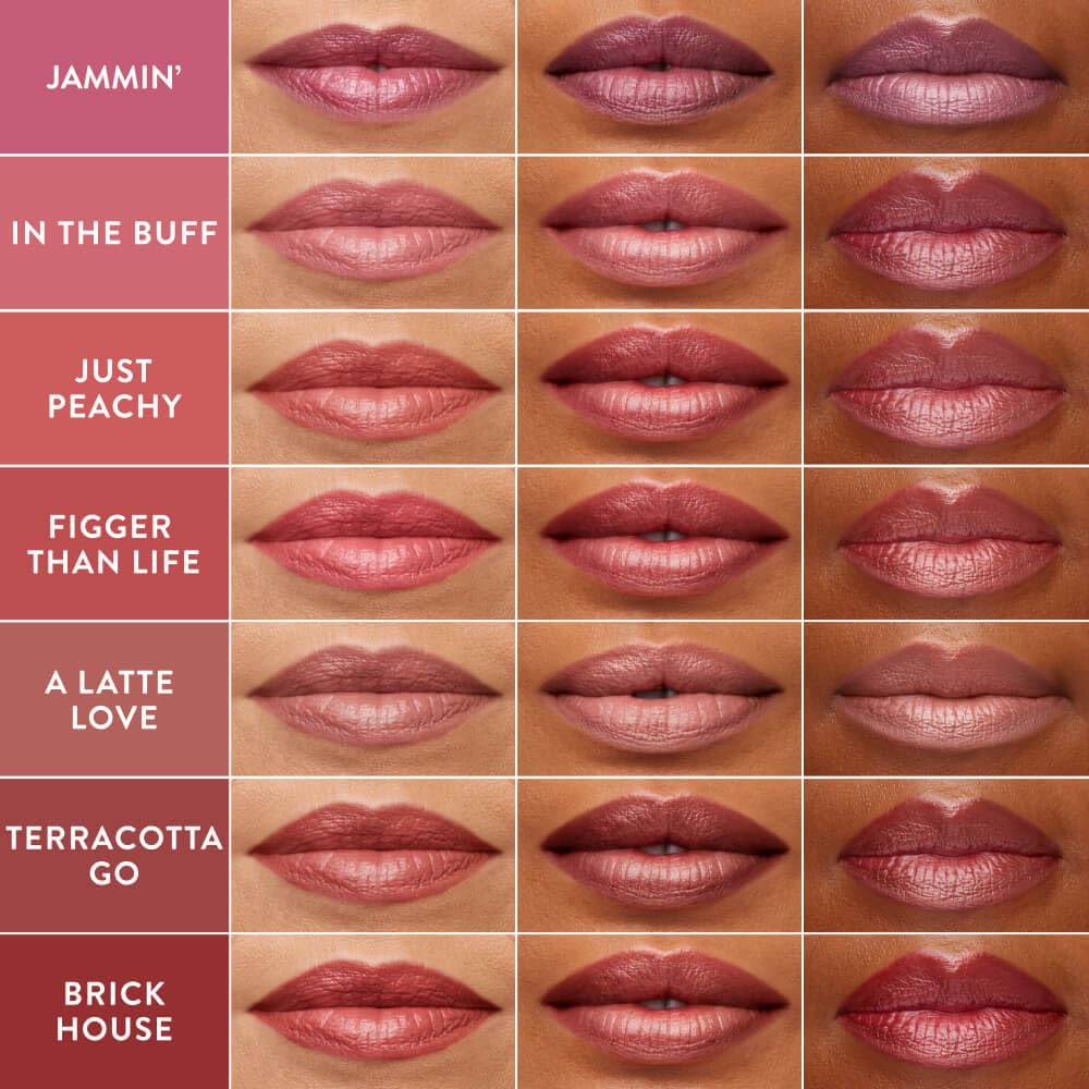 LAURA GELLER Jelly Balm Tinted Lip Balm Very Black Cherry in hand