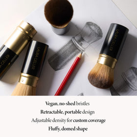 LAURA GELLER Kabuki Brush on makeup vanity