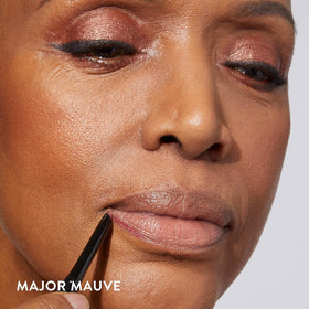 LAURA GELLER lip liner Major Mauve on makeup table