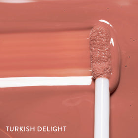 LAURA GELLER NEW YORK Color Luster Lip Gloss Turkish Delight swatch on skin