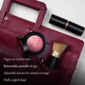 LAURA GELLER Retractable Kabuki Brush applying powder