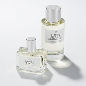 Le Monde Gourmand Citron Glacé Eau de Parfum with citrus fruits