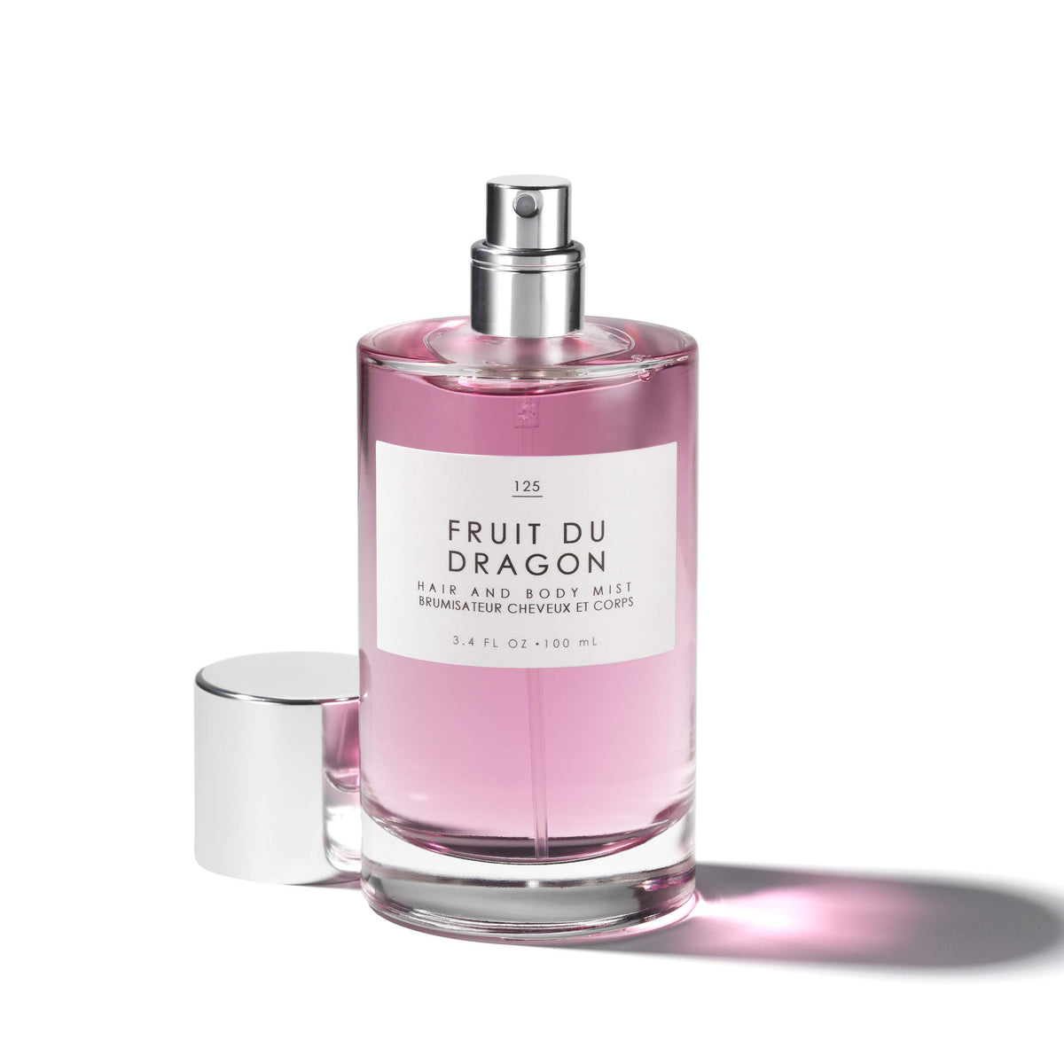 Le Monde Gourmand Fruit du Dragon Hair & Body Mist 100ml bottle with tropical fruits