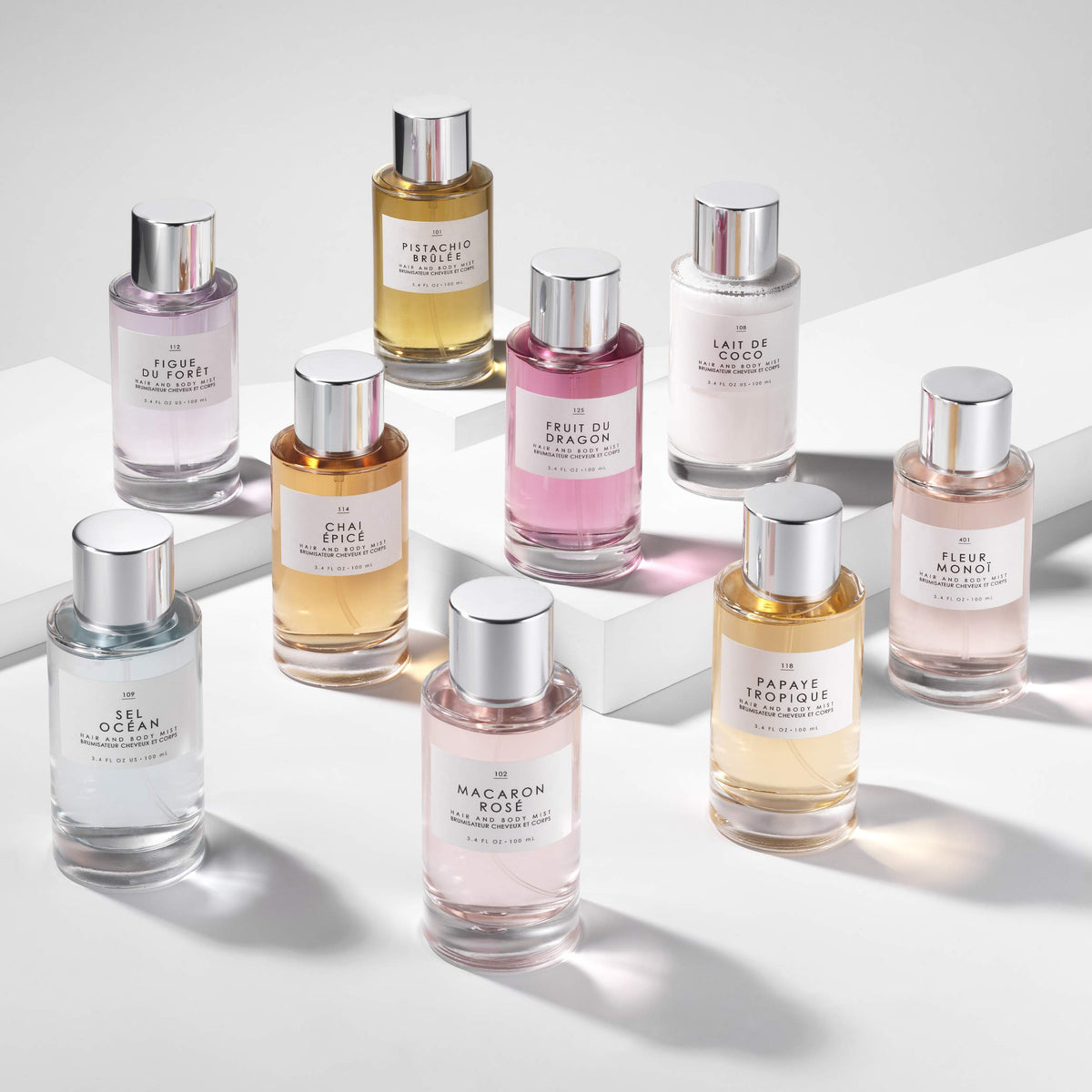 Le Monde Gourmand mist next to Acai Baie Eau de Parfum