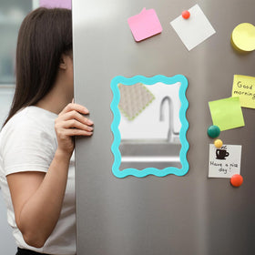 Leinuosen 5x7 Magnetic Locker Mirror displayed on a refrigerator door