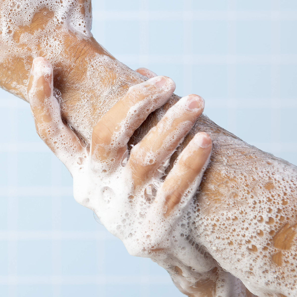 Lever 2000 Body Wash in a shower setting with water drops