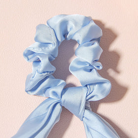 LFOUVRE scrunchies in packaging with product details