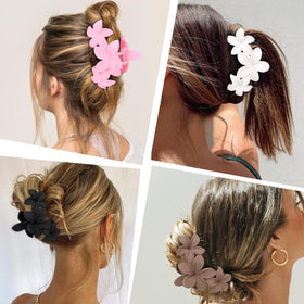 Lifestyle image of ANBALA flower hair clips in use at the beach