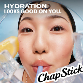Lifestyle image of ChapStick Lip Balm Set on a wooden table