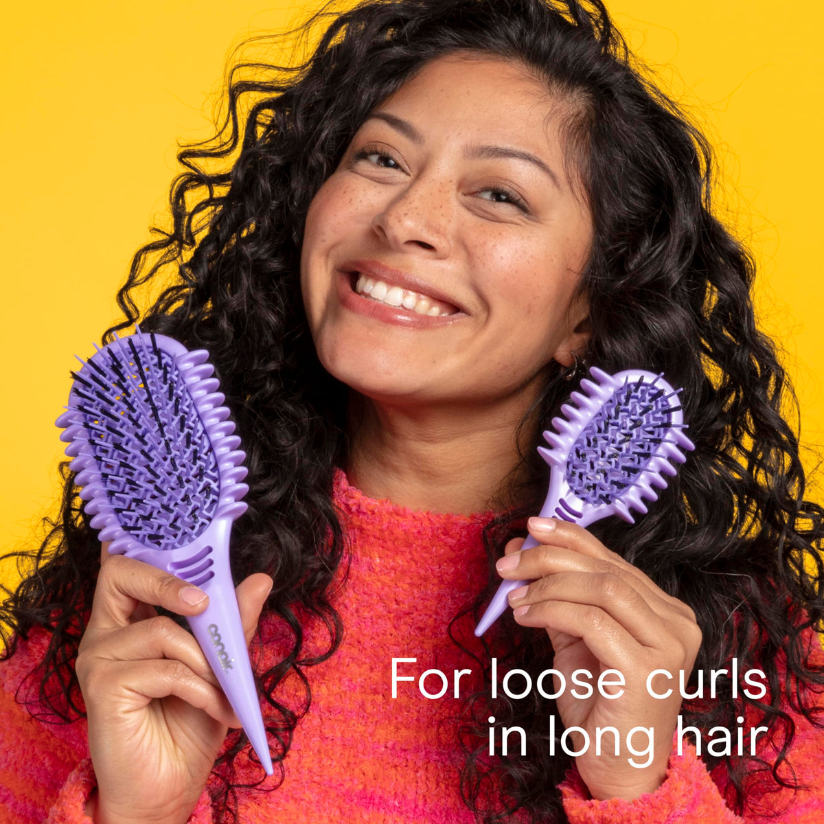 Lifestyle image of Conair brushes on a bathroom counter