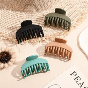 Lifestyle image of DEEKA Hair Claw Clips in use