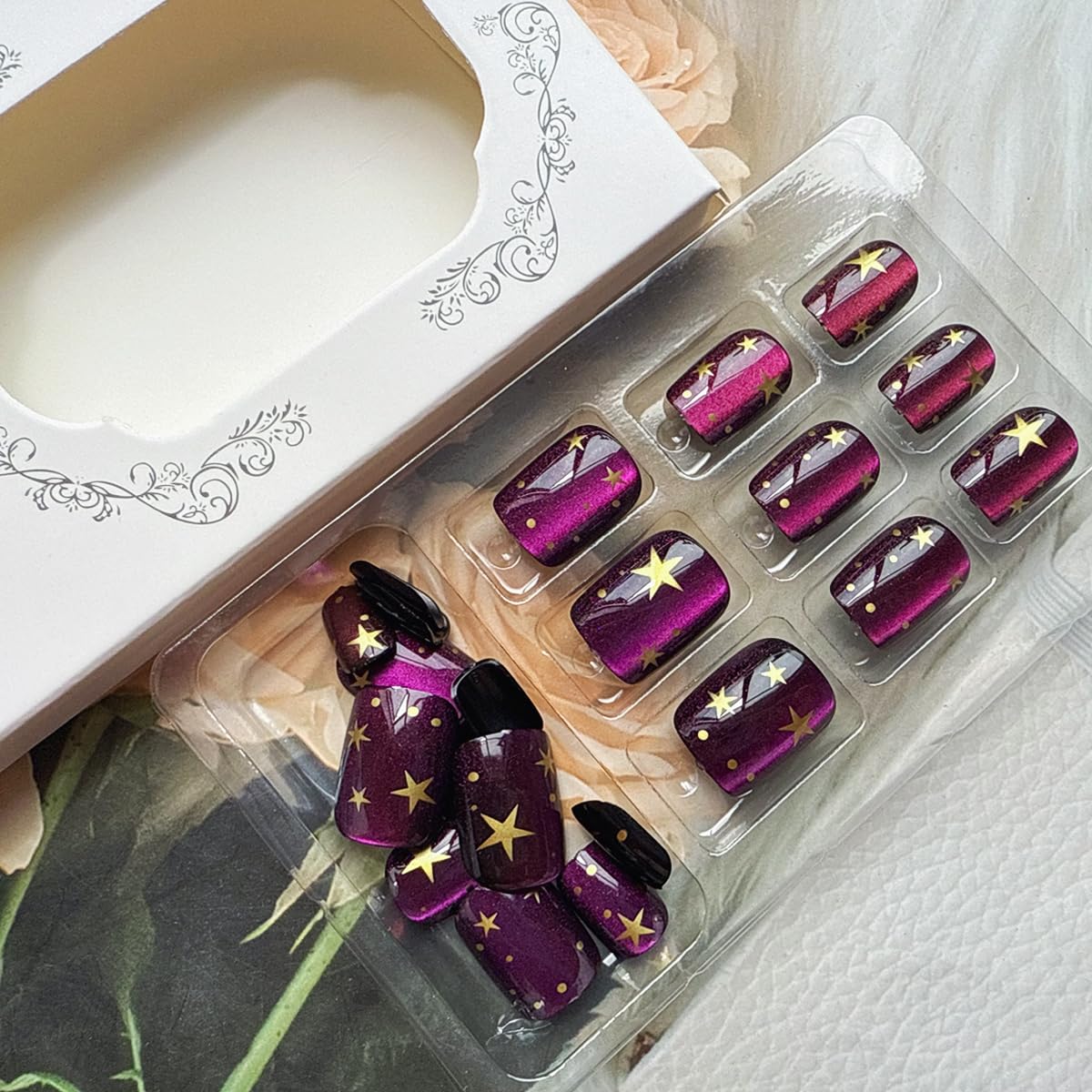 Lifestyle image of juggssa press on nails worn on hands