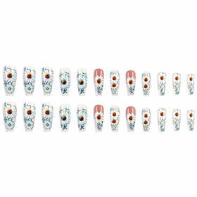 Lifestyle image of juggssa Spring Flower Press on Nails applied on hands