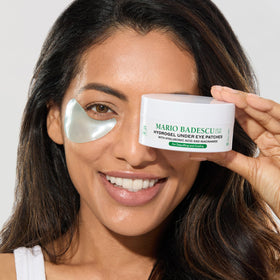 Lifestyle image of person using Mario Badescu Hydrogel Under Eye Patches