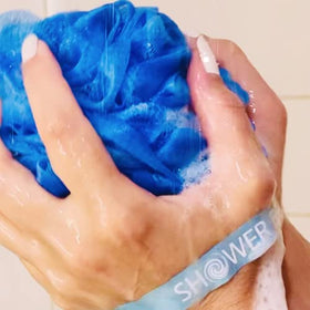 Lifestyle image of Shower Bouquet XL Loofah in use during a bath