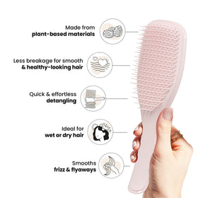 Lifestyle image of TANGLE TEEZER Plant-Based Detangler Brush in use