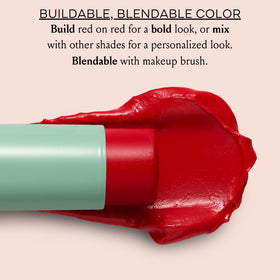 Lifestyle image of woman using BOOM! Parisian Red Cream Blush Stick