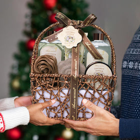 Lifestyle scene of a relaxing bath with the gift set